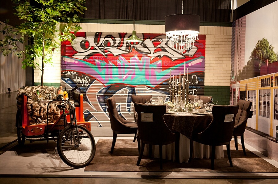 Funky dining room appears to be outdoors with a brick wall and some great graffiti art - Graffiti in interior design