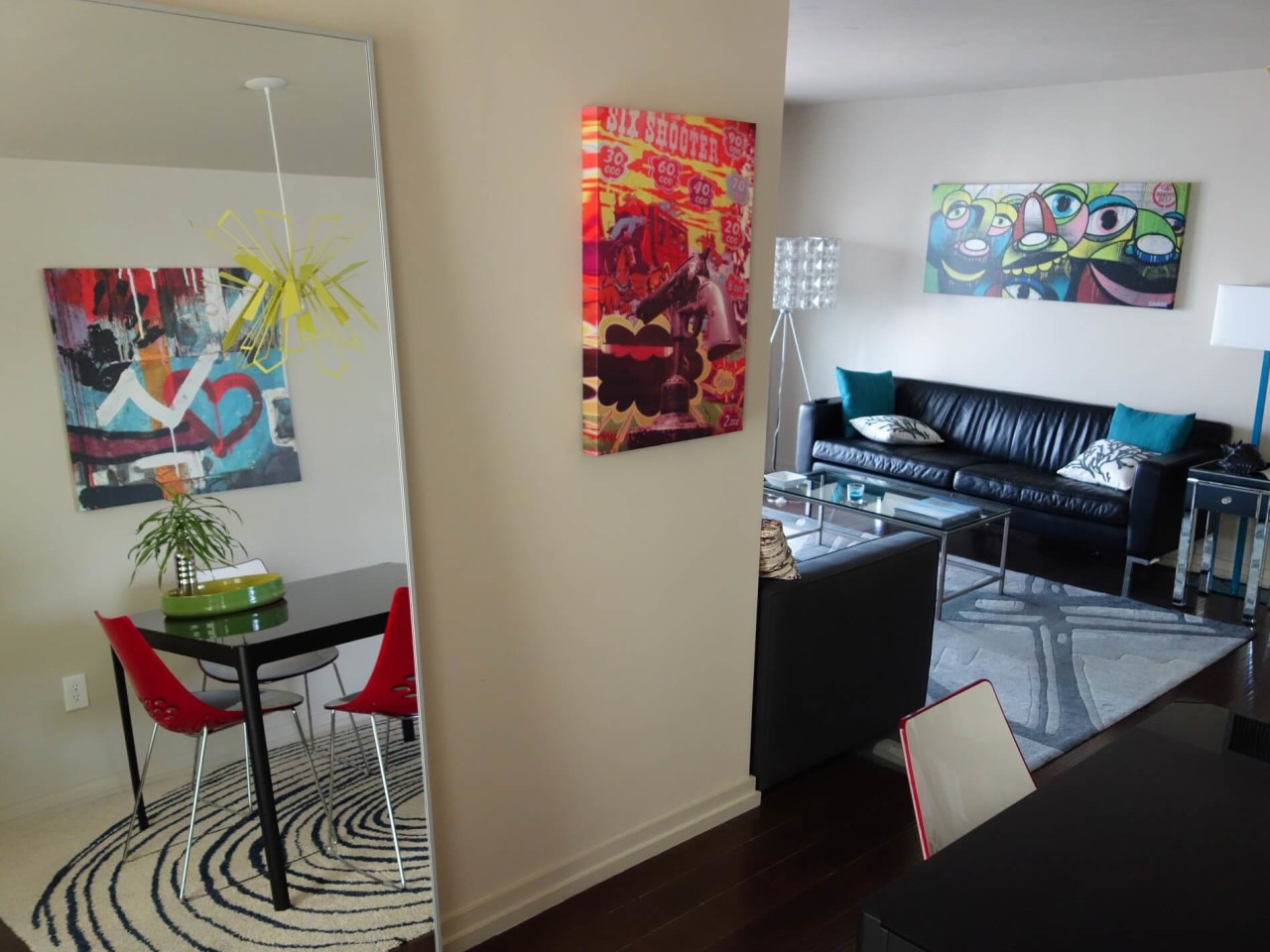 3 different street art canvases in my Miami Beach condo - Graffiti in interior design