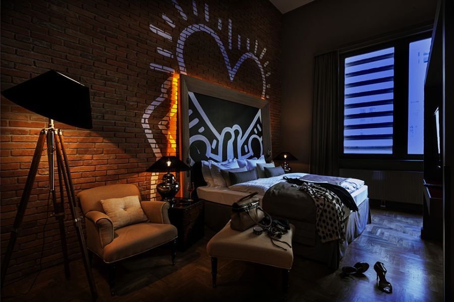 Keith Haring (replica) art used as a headboard at Baltazar Hotel, Budapest Hungary - Graffiti in interior design